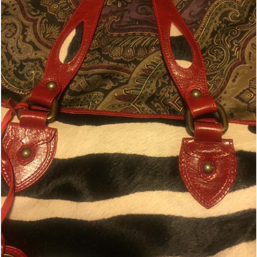 Pony skin zebra print bag red leather back